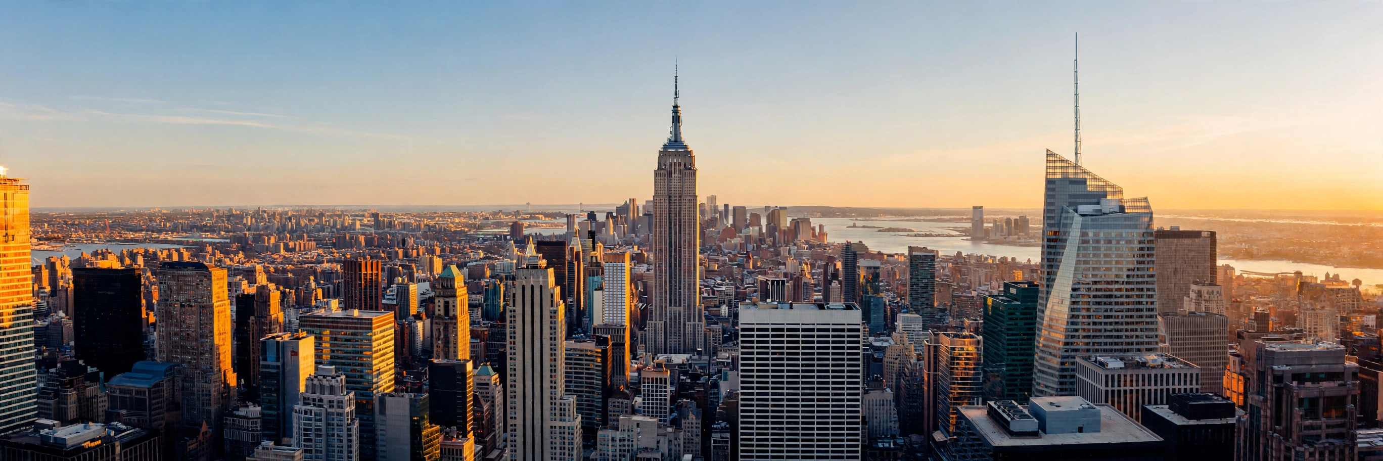 Midtown Manhattan skyline at golden hour with the Empire State Building
